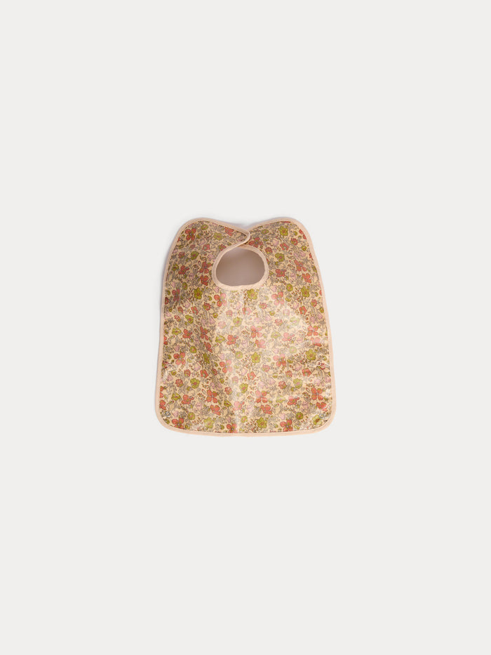 Clip-on bib in yellow Liberty fabric in coated organic cotton