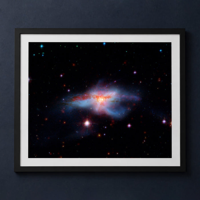 Framed print mockup — Spitzer Colliding Galaxies